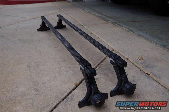 Black Thule roof rack on concrete