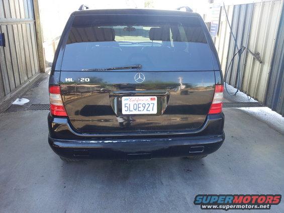 Black 2000 Mercedes-Benz ML-Class SUV rear view, California license plate 5LQ E927