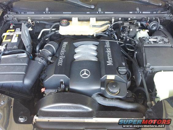 Mercedes-Benz V8 engine with "Mercedes-Benz" text on valve covers
