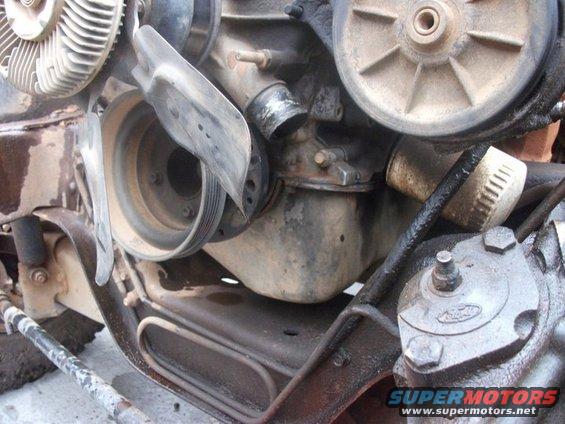 Engine pulleys, fan, and steering gear with Ford logo