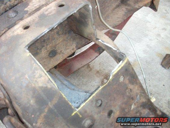 Cut frame section with yellow markings and a wire