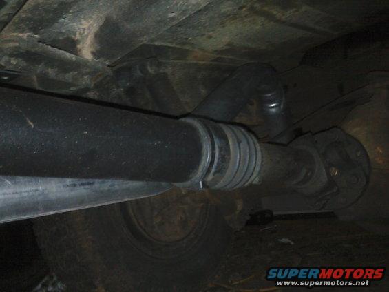 Close-up of a vehicle's driveshaft and U-joint