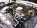 1975 Chevrolet Chevelle - The engine bay of a 1975 Chevrolet Chevelle is visible, with the V8 engine and associated components clearly displayed.