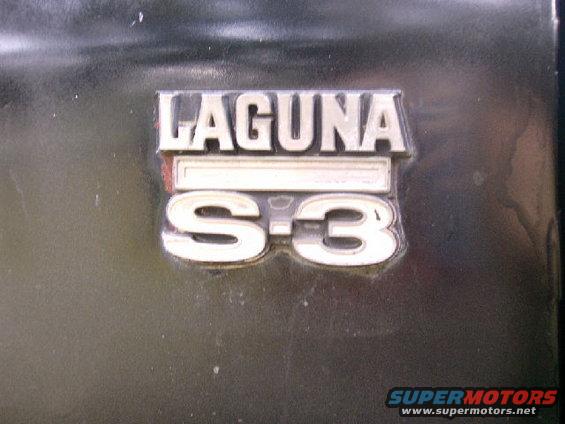 Laguna S-3 emblem on dark vehicle body