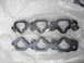 1993 Mazda MX-3 - Two engine gaskets are shown laid out on bubble wrap, one above the other.