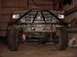 1992 Ford Bronco - This modified Ford truck features a prominent bull bar, winch, and lifted suspension, with large off-road tires.