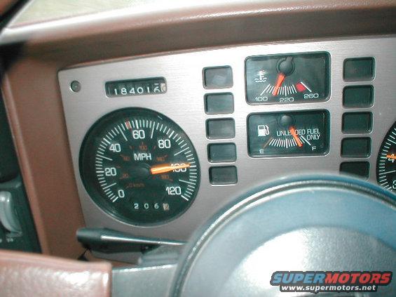 dashboard with odometer showing 184016, speedometer, fuel gauge, and temperature gauge