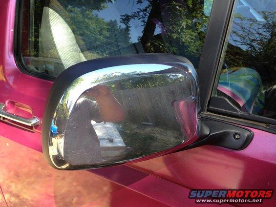 img_10741.jpg Rebuilt mirror. Original glass and chrome cap were swapped onto a used OEM mirror I got for $5. Painted and cleaned up.