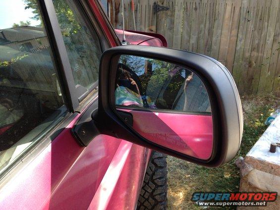 img_10761.jpg Rebuilt mirror. Original glass and chrome cap were swapped onto a used OEM mirror I got for $5. Painted and cleaned up.