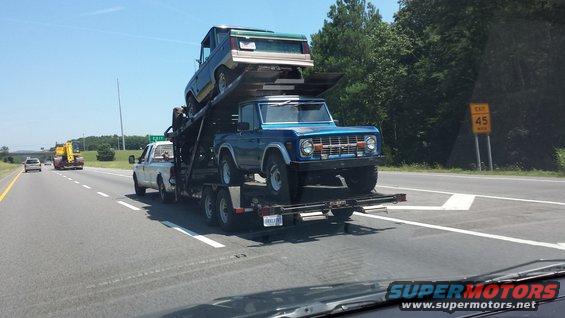 Blue 1978 Ford Bronco on a car hauler, front view