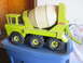 2004 Aston Martin Virage - A vintage Tonka cement mixer toy truck is shown from a three-quarter front view.