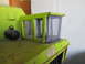 2004 Aston Martin Virage - Detail of a vintage toy truck's cab, showing its construction and accessories.