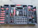 2004 Aston Martin Virage - A Husky brand tool kit is open, displaying an assortment of wrenches, sockets, pliers, and a hammer.