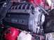 1996 BMW 3 Series - Close-up of a BMW engine, likely an M50, showing the valve cover and associated components.