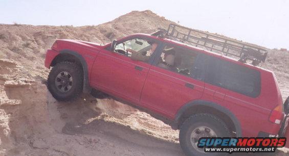 chris-posing.jpg i was trying to get him to climb up it but the boss said "no"