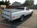 1973 Ford Ranchero - Rear view of a white 1973 Ford Ranchero with a black tonneau cover.