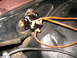 1975 Chevrolet Chevelle - A starter solenoid with connected wiring is shown in detail, mounted in a vehicle's engine bay.