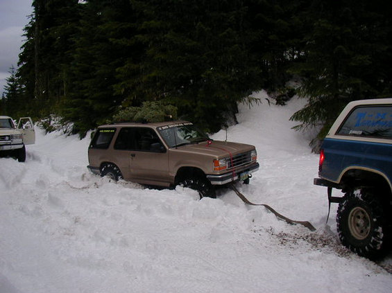 pc200068.jpg I didn't end up in the ditch this time ! But I did get a little buried in the deep snow as we were backing out to leave. So Tim gave me a tug.