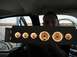 1970 Ford Falcon - Custom gauge cluster with multiple gauges is being held up inside a vehicle.
