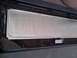 1994 Ford Bronco - Insulation has been applied to a section of the vehicle's interior panel, covering a vent.