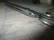 2004 Aston Martin Virage - A close-up view of metal scissors, showing their serrated blades and handles.