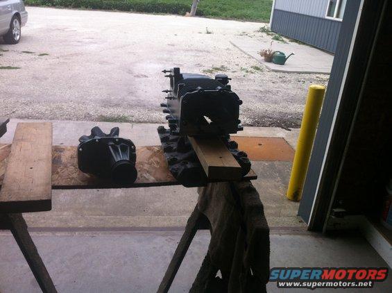 Engine block and transmission on sawhorses