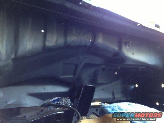 1979 Ford F-350 engine bay, dark interior, some blue cloth visible
