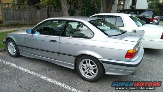 Silver 1997 BMW 3 Series coupe, rear 3/4 view
