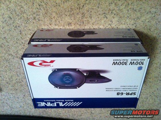Two boxes of Alpine SPR-68 coaxial 2-way speaker systems. Boxes show speaker images and specifications
