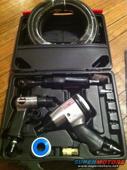 Tool kit with air ratchet, impact wrench, and hose