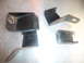 1993 Mazda MX-3 - Set of three used seat mounting brackets, showing signs of wear and rust.