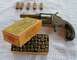 1968 Mercury Cougar - A vintage revolver is displayed with its ammunition, including a box of Winchester cartridges.