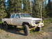 1989 Chevrolet C/K Pickup - This 1987 Chevrolet C/K Pickup features a lifted suspension and large off-road tires.