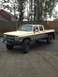 1989 Chevrolet C/K Pickup - This lifted 1989 Chevrolet C/K Pickup features a two-tone paint scheme and off-road tires.