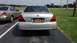2008 Mercury Grand Marquis - The rear of a silver 2008 Mercury Grand Marquis is shown, parked in a lot.