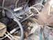 1986 Ford Bronco II - This photo shows the steering column linkage and surrounding engine bay components, with an 'ENGINE OIL' label visible.