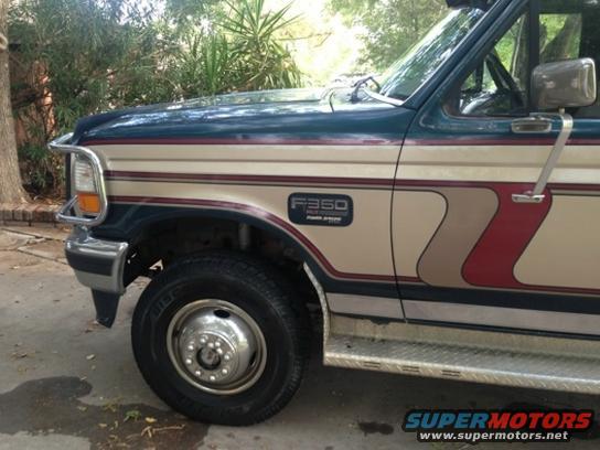 Ford F-350 truck front fender and door with tan and red stripe graphics