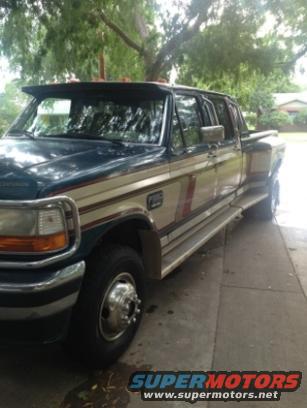 Crew cab dually truck with visor, dark green and tan