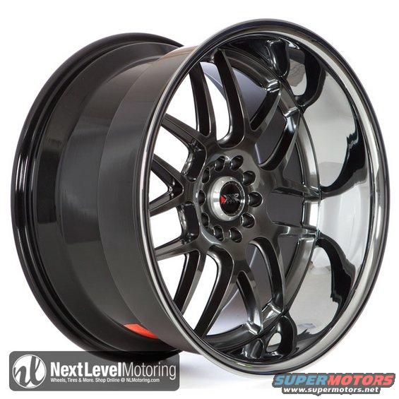 Shiny aftermarket car wheel with a dark grey and chrome finish