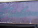 1969 Ford Fairlane - Close-up of weathered script lettering on a vehicle's body panel.