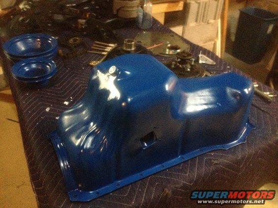 Blue oil pan with white marking