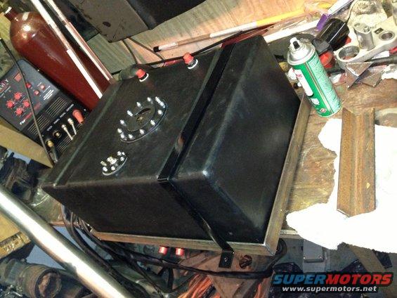 aftermarket fuel tank with two fill necks and a sump