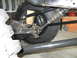 1992 Ford Bronco - Rear axle and suspension parts are visible in this close-up shot of a vehicle's undercarriage.