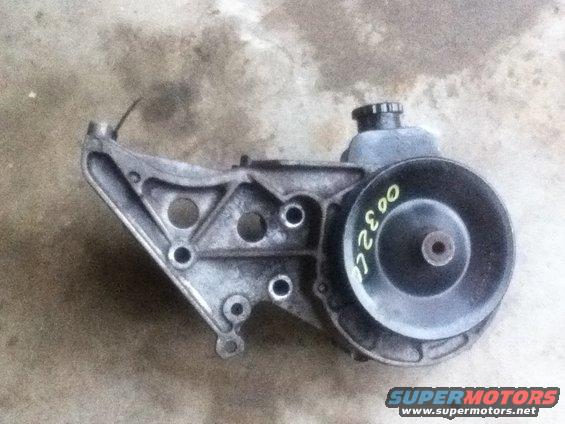 Power steering pump assembly with pulley and reservoir, marked with "003200"