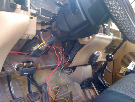 Interior of 1997 Dodge 3500 with exposed wiring and dashboard removed
