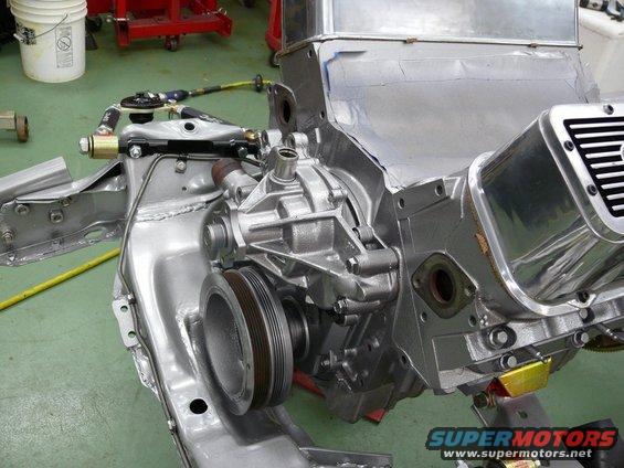 engine block and water pump assembly on a stand