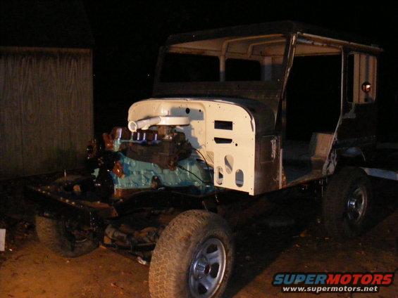 Toyota Land Cruiser FJ40 body with engine installed, missing doors and roof