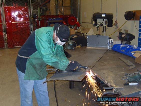 working on corner blanks,cutting out the wheel openings.