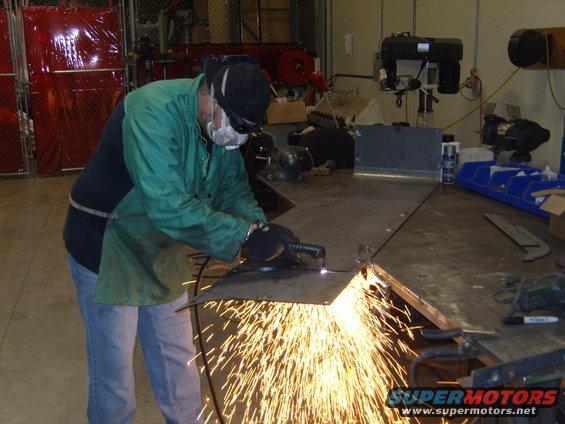 working on corner blanks,cutting out the wheel openings.