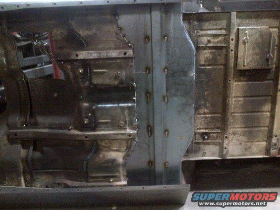 Jeep CJ7 chassis with new metal panels welded to the floor pan and rocker panel